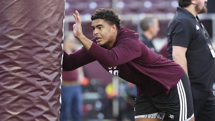 Nov 15, 2025; College Station, Texas, USA; Texas A&M Aggies defensive end Marco Jones (10) warms up before the game against the South Carolina Gamecocks at Kyle Field. Mandatory Credit: Troy Taormina-Imagn Images