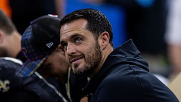 Oct 13, 2024; New Orleans, Louisiana, USA;  New Orleans Saints quarterback Derek Carr (4) looks on as he is sidelined with an injury during the second half against the Tampa Bay Buccaneers at Caesars Superdome. Mandatory Credit: Stephen Lew-Imagn Images