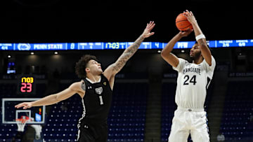 Nov 20, 2024; University Park, Pennsylvania, USA; Penn State Nittany Lions forward Zach Hicks (24) shoots the ball as Purdue Fort Wayne Mastodons guard Jalen Jackson (1) defends during the first half at Bryce Jordan Center. Mandatory Credit: Matthew O'Haren-Imagn Images