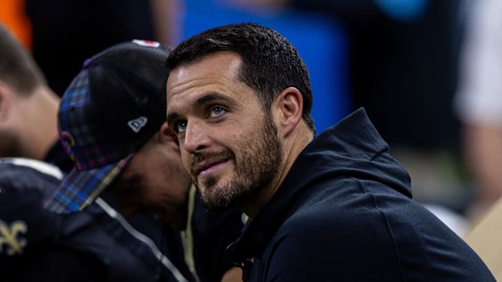 Oct 13, 2024; New Orleans, Louisiana, USA;  New Orleans Saints quarterback Derek Carr (4) looks on as he is sidelined with an injury during the second half against the Tampa Bay Buccaneers at Caesars Superdome. Mandatory Credit: Stephen Lew-Imagn Images
