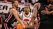 Dec 30, 2024; Stillwater, Oklahoma, USA; Oklahoma State Cowboys guard Bryce Thompson (1) drives to the basket during the first half against the Houston Cougars at Gallagher-Iba Arena. Mandatory Credit: William Purnell-Imagn Images