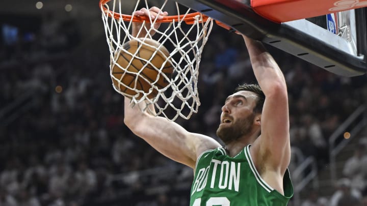 May 13, 2024; Cleveland, Ohio, USA; Boston Celtics center Luke Kornet (40) dunks against the Cleveland Cavaliers in the second quarter of game four of the second round for the 2024 NBA playoffs at Rocket Mortgage FieldHouse. Mandatory Credit: David Richard-USA TODAY Sports