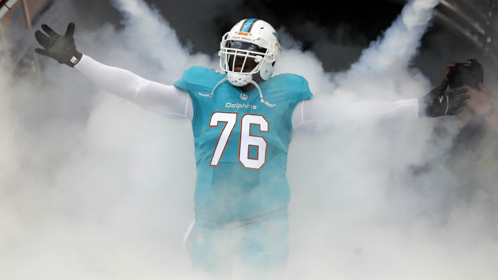 Offensive tackle Branden Albert  is introduced before the Dolphins' 2016 regular season finale against the New England Patriots at Hard Rock Stadium.