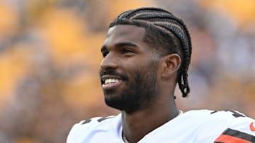 Oct 12, 2025; Pittsburgh, Pennsylvania, USA; Cleveland Browns quarterback Shedeur Sanders (12) watches the action against the Pittsburgh Steelers during the fourth quarter at Acrisure Stadium. 