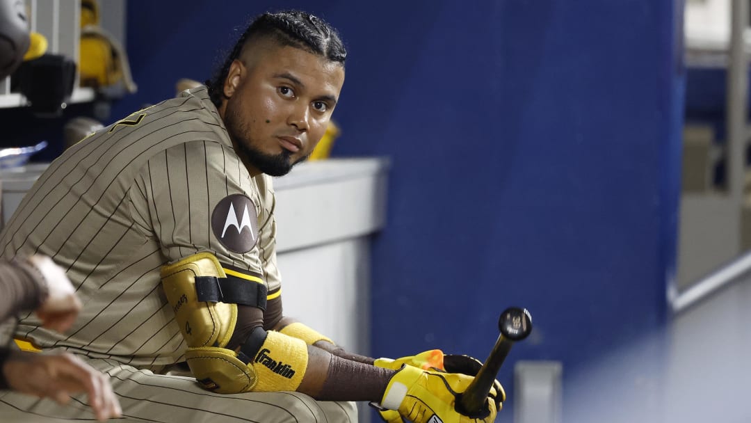 Aug 9, 2024; Miami, Florida, USA;  San Diego Padres designated hitter Luis Arraez (4) sits in the dugout against the Miami Marlins in the fifth inning at loanDepot Park. Mandatory Credit: Rhona Wise-USA TODAY Sports