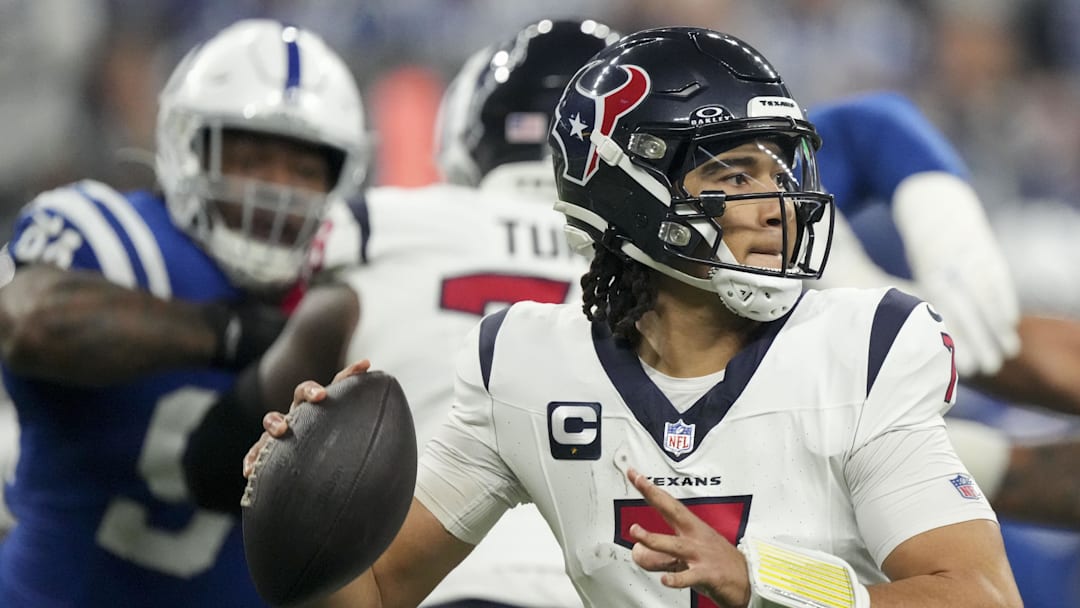 Jan 6, 2024; Indianapolis, Indiana, USA; Houston Texans quarterback C.J. Stroud (7) drops back to pass against the Indianapolis Colts at Lucas Oil Stadium. Mandatory Credit: Robert Scheer-Imagn Images