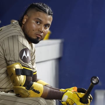 Aug 9, 2024; Miami, Florida, USA;  San Diego Padres designated hitter Luis Arraez (4) sits in the dugout against the Miami Marlins in the fifth inning at loanDepot Park. Mandatory Credit: Rhona Wise-USA TODAY Sports