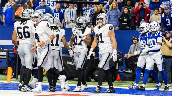 Dec 31, 2023; Indianapolis, Indiana, USA; Las Vegas Raiders wide receiver Davante Adams (17) celebrates his touchdown with teammates in the second half against the Indianapolis Colts at Lucas Oil Stadium. Mandatory Credit: Trevor Ruszkowski-USA TODAY Sports