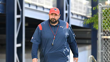 Jul 30, 2022; Foxborough, MA, USA; New England Patriots senior football advisor Matt Patricia walks to the practice field at the Patriots training camp at Gillette Stadium. Mandatory Credit: Eric Canha-Imagn Images
