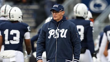 Nov 30, 2024; University Park, Pennsylvania, USA; Penn State Nittany Lions defensive coordinator Tom Allen walks on the field during warm ups before a game against the Maryland Terrapins at Beaver Stadium. Mandatory Credit: Matthew O'Haren-Imagn Images