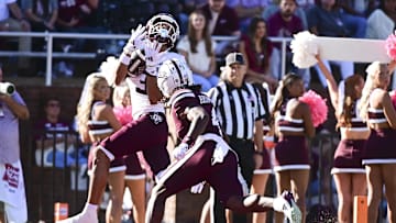 Oct 19, 2024; Starkville, Mississippi, USA; Texas A&M Aggies wide receiver Noah Thomas (3) makes a reception for a touchdown against Mississippi State Bulldogs cornerback DeAgo Brumfield (4) during the first quarter at Davis Wade Stadium at Scott Field. Mandatory Credit: Matt Bush-Imagn Images