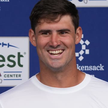 East Rutherford, NJ -- June 11, 2024 -- Quarterback, Daniel Jones is interviewed at the end of practice field at the NY Giants Mandatory Minicamp at their practice facility in East Rutherford, NJ.