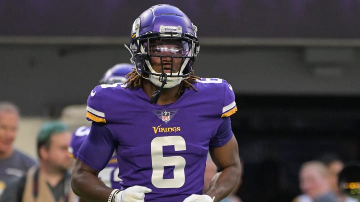 Aug 20, 2022; Minneapolis, MN; Minnesota Vikings safety Lewis Cine (6) warms up before the game against the San Francisco 49ers at U.S. Bank Stadium. 