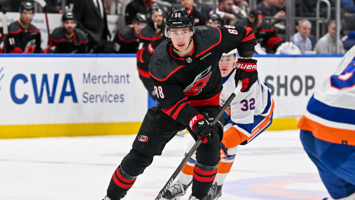 Mar 19, 2024; Elmont, New York, USA; Carolina Hurricanes center Martin Necas (88) skates across the blue line against the New York Islanders during the first period at UBS Arena. Mandatory Credit: Dennis Schneidler-USA TODAY Sports