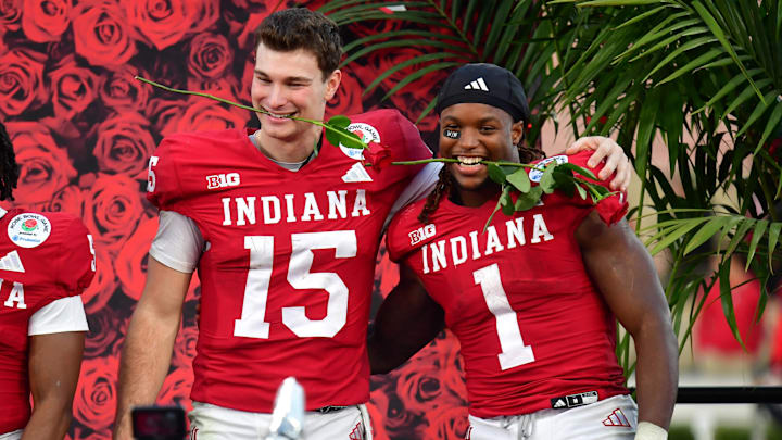 Indiana quarterback Fernando Mendoza and running back Roman Hemby celebrate after defeating Alabama in the Rose Bowl.