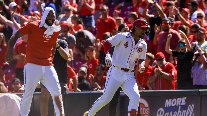 Sep 1, 2024; Cincinnati, Ohio, USA; Cincinnati Reds pinch hitter Santiago Espinal (4) celebrates after the victory over the Milwaukee Brewers at Great American Ball Park. Mandatory Credit: Katie Stratman-USA TODAY Sports