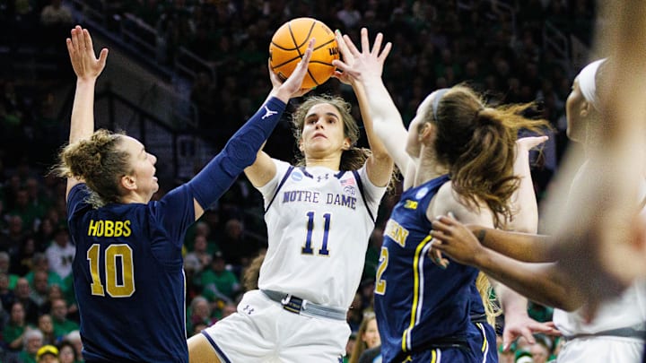 Notre Dame guard Sonia Citron (11) shoots the ball during the second round of the NCAA Women's Basketball Tournament between Notre Dame and Michigan at Purcell Pavilion on Sunday, March 23, 2025, in South Bend. Notre Dame guard Sonia Citron (11) shoots the ball during the second round of the NCAA Women's Basketball Tournament between Notre Dame and Michigan at Purcell Pavilion on Sunday, March 23, 2025, in South Bend.