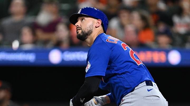 Jul 8, 2026; Baltimore, Maryland, USA;  Chicago Cubs outfielder Michael Conforto (20) hits a deep fly ball that the Baltimore Orioles outfielder committed an error in fielding, leading to Conforto getting to second base in the eighth inning against the Baltimore Orioles at Oriole Park at Camden Yards. Mandatory Credit: Jamie Sabau-Imagn Images