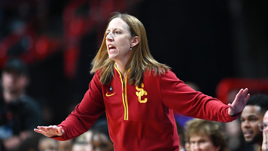 Mar 31, 2025; Spokane, WA, USA; USC Trojans head coach Lindsay Gottlieb reacts after a play against the UConn Huskies during the first half of an Elite 8 NCAA Tournament game at Spokane Arena. Mandatory Credit: James Snook-Imagn Images
