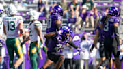 Oct 18, 2025; Fort Worth, Texas, USA; TCU Horned Frogs safety Bud Clark (21) reacts after sacking Baylor Bears quarterback Sawyer Robertson (13) during the second half of a game at Amon G. Carter Stadium. Mandatory Credit: Raymond Carlin III-Imagn Images