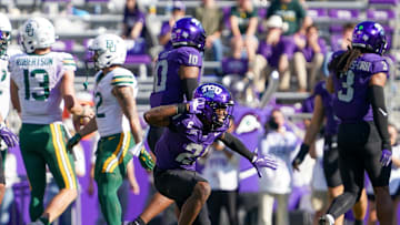 Oct 18, 2025; Fort Worth, Texas, USA; TCU Horned Frogs safety Bud Clark (21) reacts after sacking Baylor Bears quarterback Sawyer Robertson (13) during the second half of a game at Amon G. Carter Stadium. Mandatory Credit: Raymond Carlin III-Imagn Images