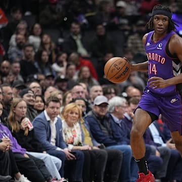 Apr 3, 2025; Toronto, Ontario, CAN; Toronto Raptors guard Ja'Kobe Walter (14) dribbles up court against the Portland Trail Blazers during the first half at Scotiabank Arena. Mandatory Credit: John E. Sokolowski-Imagn Images