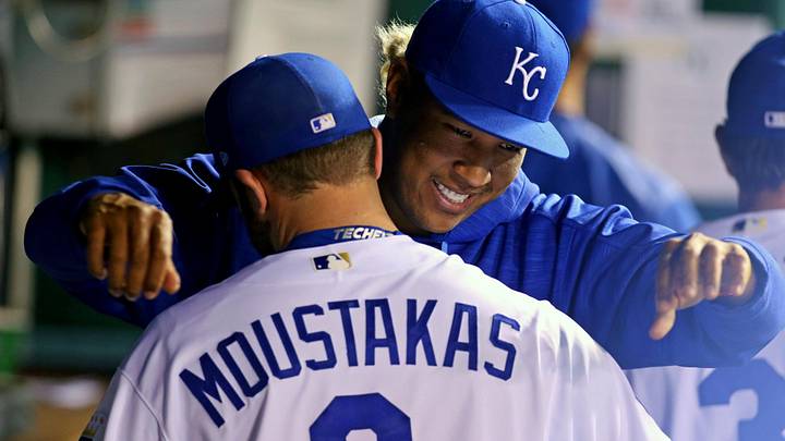Sep 30, 2017; Kansas City, MO, USA; Kansas City Royals third baseman Mike Moustakas (8) is hugged by catcher Salvador Perez (13) after exiting the game against the Arizona Diamondbacks in the sixth inning at Kauffman Stadium. Mandatory Credit: Jay Biggerstaff-Imagn Images