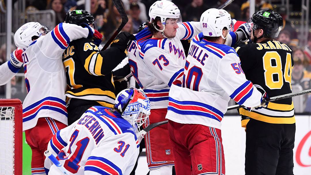 Sep 29, 2026; Boston, Massachusetts, USA;  Boston Bruins center Mark Kastelic (47) grabs a hold of New York Rangers center Matt Rempe (73) during the third period at TD Garden. Mandatory Credit: Bob DeChiara-Imagn Images