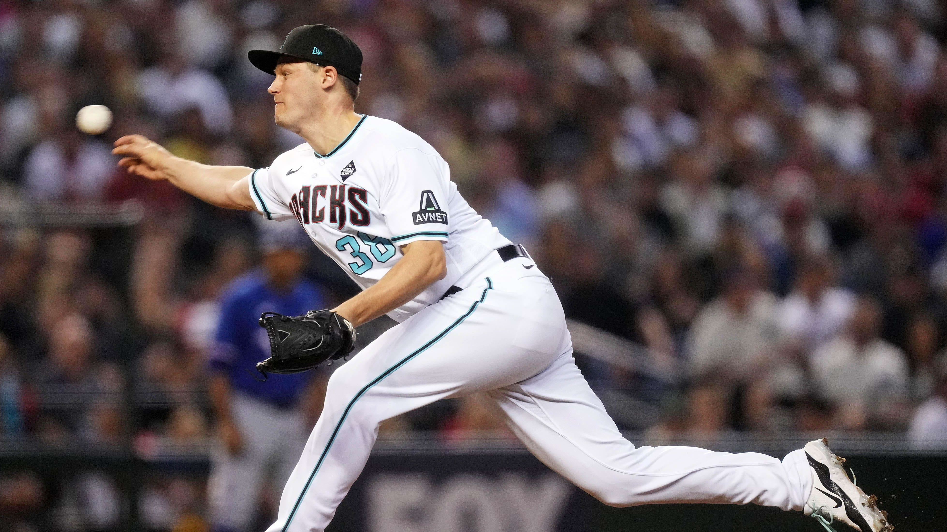 Arizona Diamondbacks relief pitcher Paul Sewald (38) pitches during the ninth inning during game