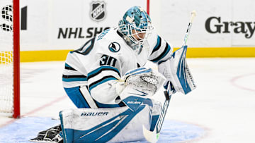 Nov 21, 2024; St. Louis, Missouri, USA;  San Jose Sharks goaltender Yaroslav Askarov (30) defends the net against the St. Louis Blues during the second period at Enterprise Center. Mandatory Credit: Jeff Curry-Imagn Images