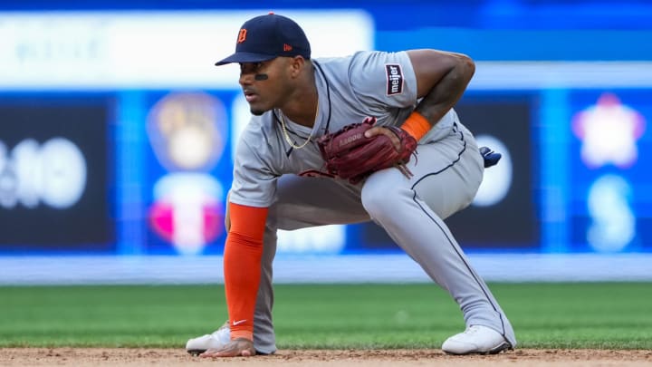 Jul 20, 2024; Toronto, Ontario, CAN; Detroit Tigers second base Andy Ibanez (77) touches the dirt at an MLB game against the Toronto Blue Jays at Rogers Centre. Mandatory Credit: Kevin Sousa-USA TODAY Sports