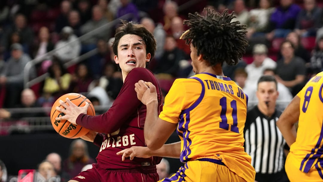 Luka Toews defends the ball from Dedan Thomas Jr. at Conte Forum on Dec. 3, 2025. Luka Toews defends the ball from Dedan Thomas Jr. at Conte Forum on Dec. 3, 2025.