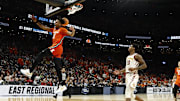 Mar 28, 2024; Boston, MA, USA; Illinois Fighting Illini guard Terrence Shannon Jr. (0) dunks the ball against the Iowa State Cyclones in the semifinals of the East Regional of the 2024 NCAA Tournament at TD Garden. Mandatory Credit: Winslow Townson-Imagn Images