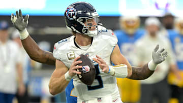 Nov 10, 2024; Inglewood, California, USA;  Tennessee Titans quarterback Will Levis (8) is sacked by Los Angeles Chargers linebacker Bud Dupree (48) in the second half at SoFi Stadium. Mandatory Credit: Jayne Kamin-Oncea-Imagn Images