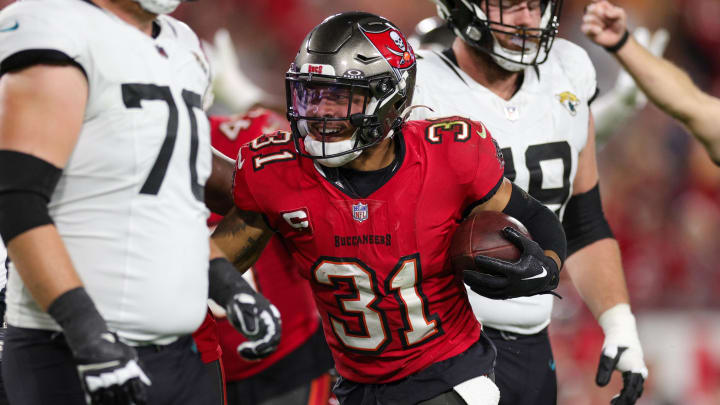 Dec 24, 2023; Tampa, Florida, USA;  Tampa Bay Buccaneers safety Antoine Winfield Jr. (31) reacts after recovering a fumble against the Jacksonville Jaguars in the fourth quarter at Raymond James Stadium. Mandatory Credit: Nathan Ray Seebeck-USA TODAY Sports