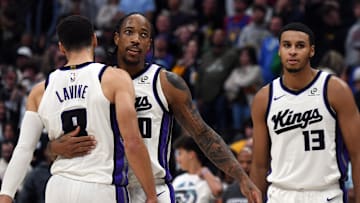 Nov 22, 2025; Denver, Colorado, USA; Sacramento Kings guard DeMar DeRozan (10) celebrates with guard Zach LaVine (8) after a made shot late in the second half of a win against the Denver Nuggets at Ball Arena.