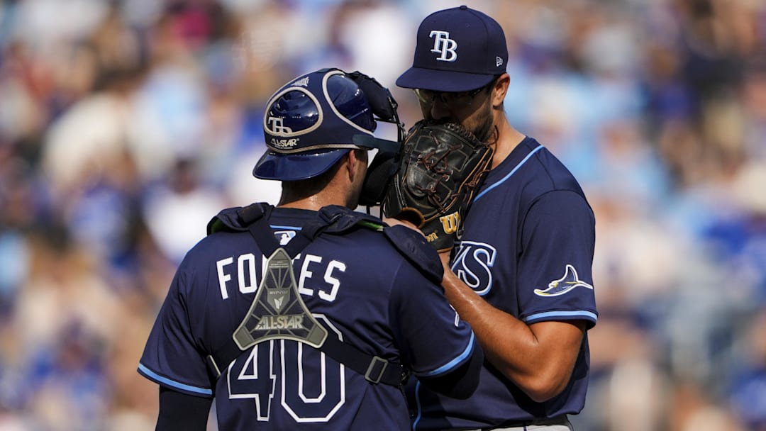 Sep 27, 2025; Toronto, Ontario, CAN; Tampa Bay Rays pitcher Joe Boyle (36) gets a mound visit by Tampa Bay Rays catcher Nick Fortes (40) during the fourth inning against the Toronto Blue Jays at Rogers Centre.