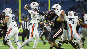 Dec 30, 2023; Nashville, TN, USA; Maryland Terrapins defensive lineman Daniel Owens (39) grabs the