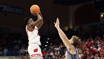 Nov 28, 2025; San Diego, CA, USA; Wisconsin Badgers guard John Blackwell (25) shoots the ball against Texas Christian University Horned Frogs during the first half at Jenny Craig Pavilion. 