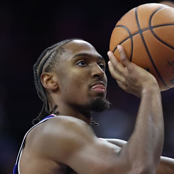 Oct 27, 2025; Philadelphia, Pennsylvania, USA; Philadelphia 76ers guard Tyrese Maxey (0) shoots a foul shot against the Orlando Magic during the third quarter at Xfinity Mobile Arena. Mandatory Credit: Bill Streicher-Imagn Images