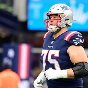 Dec 17, 2023; Foxborough, Massachusetts, USA; New England Patriots offensive tackle Conor McDermott (75) warms up before a game against the Kansas City Chiefs at Gillette Stadium. Mandatory Credit: Eric Canha-Imagn Images