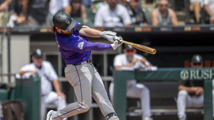 Jun 29, 2024; Chicago, Illinois, USA; Colorado Rockies second base Brendan Rodgers (7) hits a home run during the second inning against the Chicago White Sox at Guaranteed Rate Field. Mandatory Credit: Patrick Gorski-USA TODAY Sports