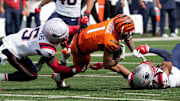 Cincinnati Bengals wide receiver Ja'Marr Chase (1) makes a catch past New England Patriots safety Jabrill Peppers (5) and safety Kyle Dugger (23) at Paycor Stadium Sunday, September 8, 2024. The Patriots beat the Bengals 16-10.