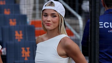 LSU former gymnast Olivia Dunne on the field before a game between the New York Mets and the Pittsburgh Pirates at Citi Field.