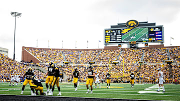 Iowa defensive back Cooper DeJean (3) downs a punt inside the 1-yard-line during a NCAA football game against South Dakota State, Saturday, Sept. 3, 2022, at Kinnick Stadium in Iowa City, Iowa.