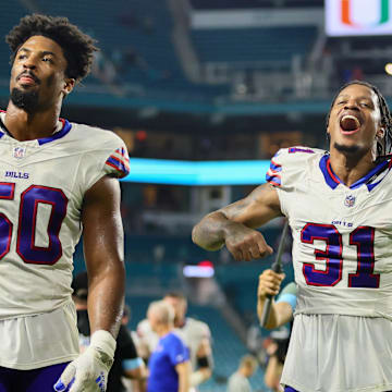 Sep 12, 2024; Miami Gardens, Florida, USA; Buffalo Bills cornerback Rasul Douglas (31) and defensive end Greg Rousseau (50) walk off the field after the game against the Miami Dolphins at Hard Rock Stadium.