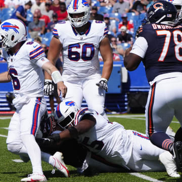 Steve Buechele cam't escape as the Bears pass rush dominated play in the second half Saturday during a 33-6 Chicago win.