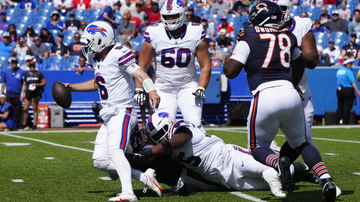 Steve Buechele cam't escape as the Bears pass rush dominated play in the second half Saturday during a 33-6 Chicago win.