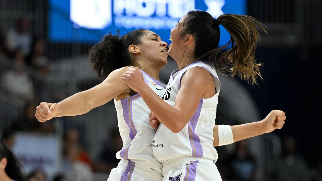 Jul 8, 2026; Toronto, Ontario, CAN;  Golden State Valkyries  forward Janelle Salaun (13) celebrates with guard Kaitlyn Chen (2) after making a basket against the Toronto Tempo in the second half at Coca-Cola Coliseum. Mandatory Credit: Dan Hamilton-Imagn Images