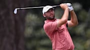 Scottie Scheffler plays his shot from the second tee during the first round of the TOUR Championship 